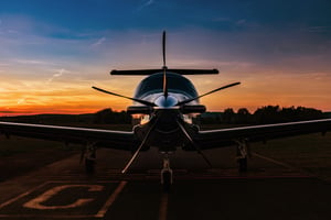 Front Angle Shot of Small Aircraft during Sunset